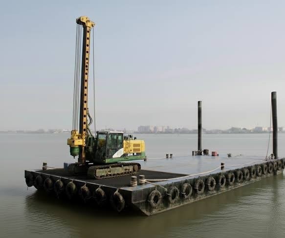 Heavy-duty modular barge deployment for temporary river infrastructure and marine work